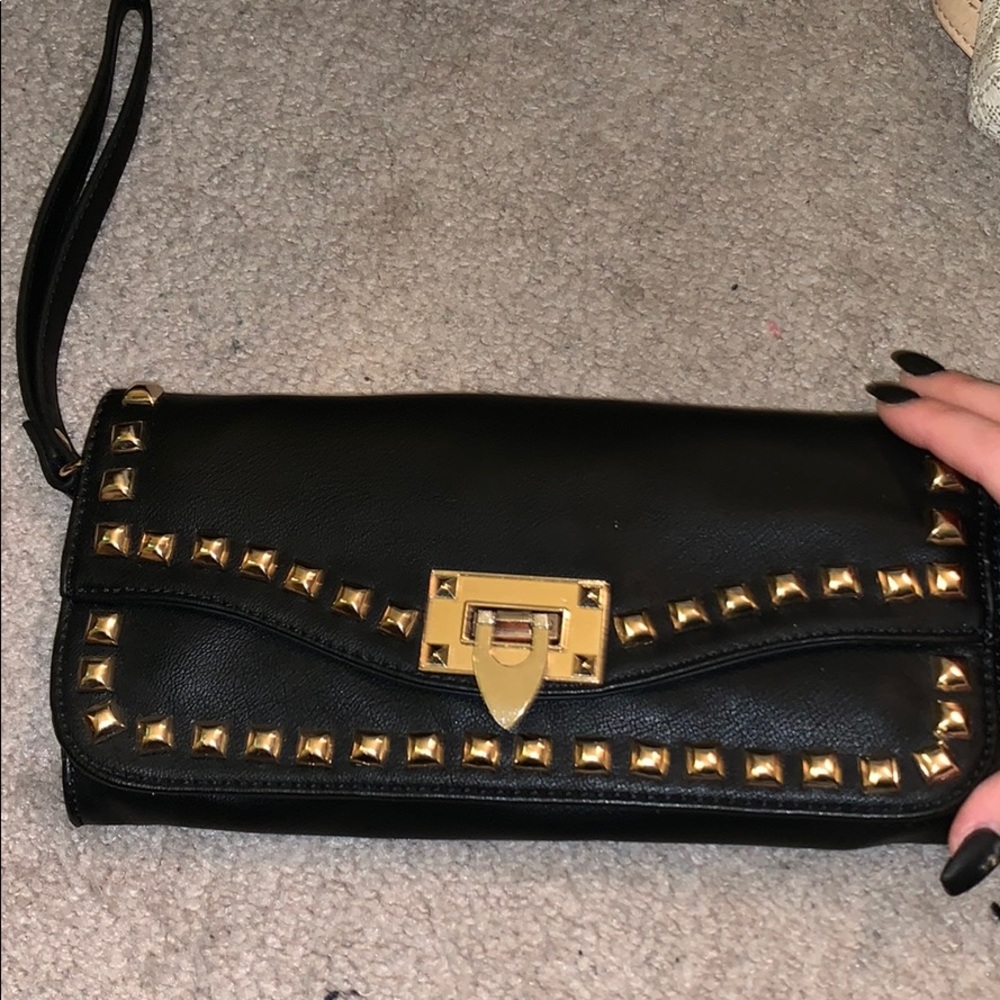 Smaller black and gold wristlet